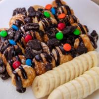 Banana And Chocolate · Banana, chocolate, oreos, m&m's and powder sugar.