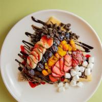 Tour De France · Strawberry, blueberry, banana, peach, Nutella, chocolate, strawberry drizzle, chocolate chip...
