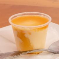 Passion Fruit Mousse · A tart and smooth passion fruit mousse whipped to perfection and topped with a tangy passion...