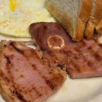 Ham Steak & Eggs · Our famous Full Ham Steak accompanied with x3 Eggs, Hash Brown, and Toast.