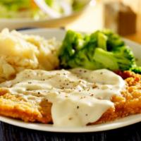 Chicken Fried Steak With Fixings · Juicy seasoned steak crisped to perfection and topped with house made country sausage gravy....