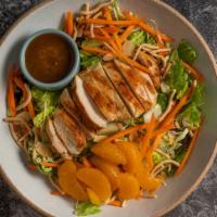 Oriental Chicken Salad · Charbroiled chicken breast, roasted almond, crispy noodle, shredded cabbage, carrot, Mandari...