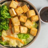 Organic Tofu Teriyaki Bowl · Wok fried organic tofu, White rice, Steamed veggies (onion, cabbage, carrot, broccoli), and ...