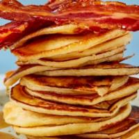 Pancakes · 2 Homemade Fluffy Buttermilk Pancakes served w Fresh Fruit and syrup. Your choice of 2 Bacon...
