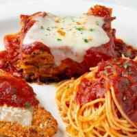 Johnny'S Combo · Johnny's Fresh Baked Lasagna, Classic Chicken Parmesan and spaghetti with tomato sauce.