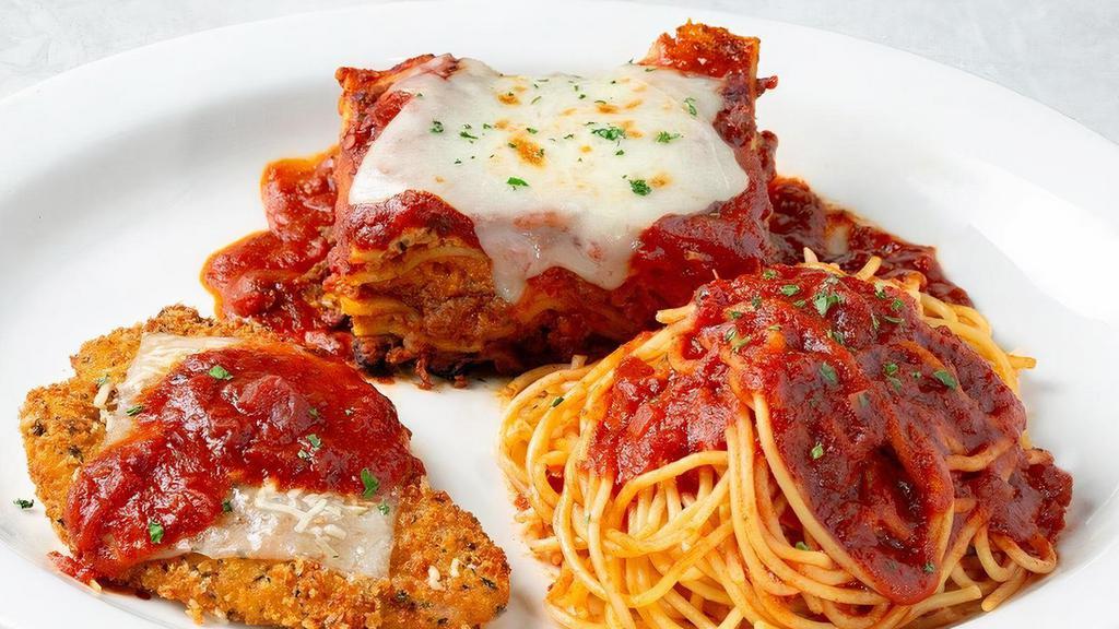 Johnny'S Combo · Johnny's Fresh Baked Lasagna, Classic Chicken Parmesan and spaghetti with tomato sauce.