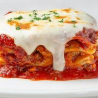 Johnny'S Fresh Baked Lasagna · Layers of pasta, Italian sausage, beef, meat sauce, ricotta, Mozzarella and Parmesan...while...