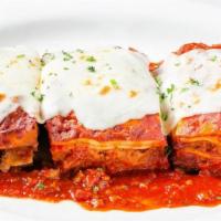 Johnny'S Fresh Baked Lasagna Family Platter · Layers of pasta, Italian sausage, beef, meat sauce, ricotta, Mozzarella and Parmesan...while...