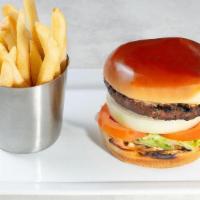 Classic American Burger* · Onion, lettuce, tomato, mayonnaise and ketchup. . Served with fries (350 Cal.). We grill our...