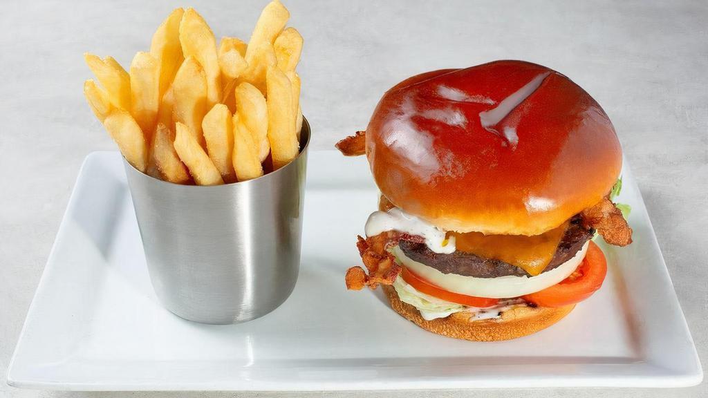 Cheddar, Bacon & Ranch Burger* · Cheddar cheese, applewood smoked bacon, onion, lettuce, tomato and ranch dressing.. Served with fries (350 Cal.). We grill our burgers medium-well.