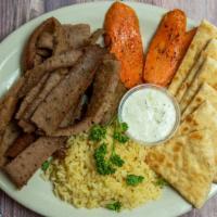 Gyro Appetizer Platter · Gyros meat, hot pita, feta cheese, Greek olives, tzatziki sauce, cucumbers, and tomatoes.