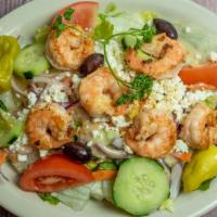 Grilled Shrimp Salad · Served with special homemade salad dressing and hot pita bread.