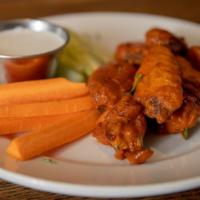 Pub Wings · cajun seasoned | tossed in the sauce of your choice