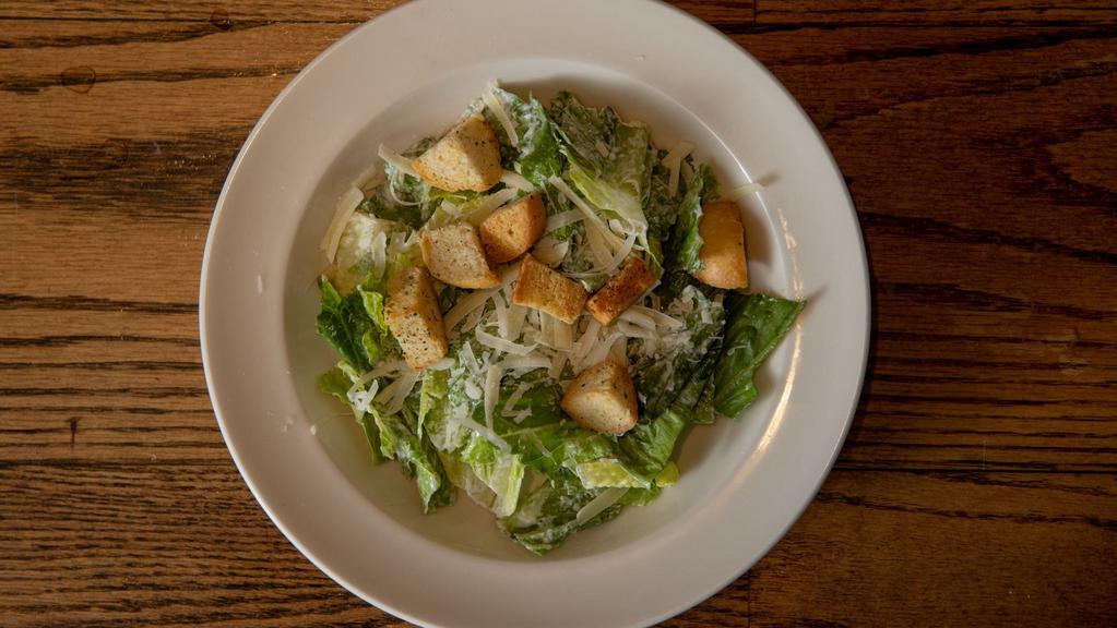 Caesar Salad · Romaine, house made croutons, parmesan, and garlic-caesar dressing.