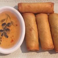 Spring Roll · Five pieces. Crispy vegetables egg rolls, served with sweet and sour sauce.