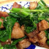 Crispy Pork Belly & Chinese Broccoli Stir Fry · Sliced crispy pork, sautéed with Chinese broccoli in oyster sauce.