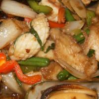 Fire Of The Sea · Spicy. Stir fried shrimp, white fish, mussels, scallop and squid with bell pepper, onion, ba...