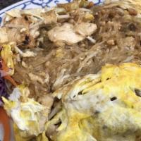 Pad Thai Woon Sen Omelette Noodle · Pan fried silver noodles with chicken, bean sprouts and ground peanuts in egg omelette style.