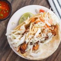 Fish Taco · (Filet of cod, lightly breaded and fried) served on two corn tortillas with onions, salsa, c...