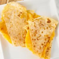 Quesadilla · We fold a large tortilla in half and stuff it with jack and cheddar cheese.