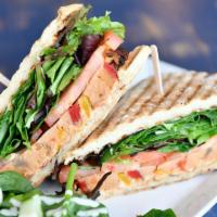 Country Turkey Meatloaf · Tomato, mixed greens and sun-dried tomato aioli served on a baguette