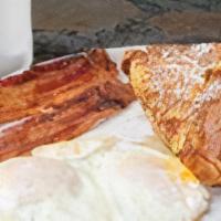 The All American · 2 eggs, 3 buttermilk pancakes, a choice of bacon or sausage. Substitute french toast for an ...