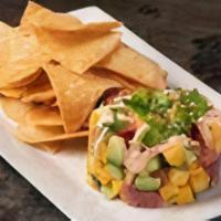 Tuna Tartare · Ahi, mango salsa, cucumber, wasabi furikake, sambal aioli, scallions and tortilla chips.