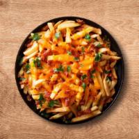 Cheesy Fries · Crisp seasoned French fries loaded with cheese.