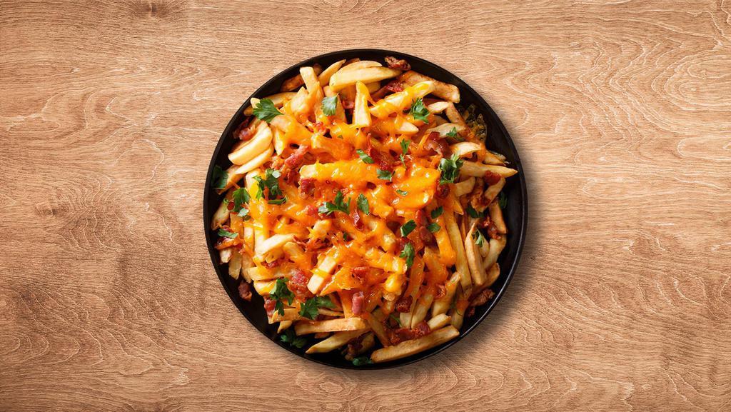 Cheesy Fries · Crisp seasoned French fries loaded with cheese.