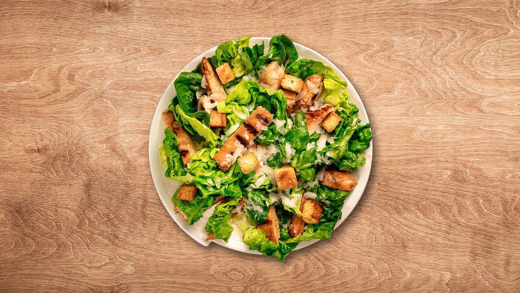 Classic Caesar Salad · Crisp, delicious romaine lettuce topped with green leaf lettuce, croutons, parmesan cheese, served with caesar dressing