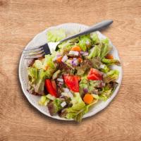 Classic House Salad · Our house special green leaf lettuce, diced tomatoes, cucumbers, and onions, served with bal...