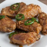 Chicken Wings · 6 piece Flats.  Crispy fried and tossed in your favorite flavor.
