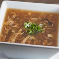 Hot 'N Sour Soup · Silken Tofu, Eggs, Bamboo shoots and dried Mushrooms in a rich & tangy broth. (32 oz)