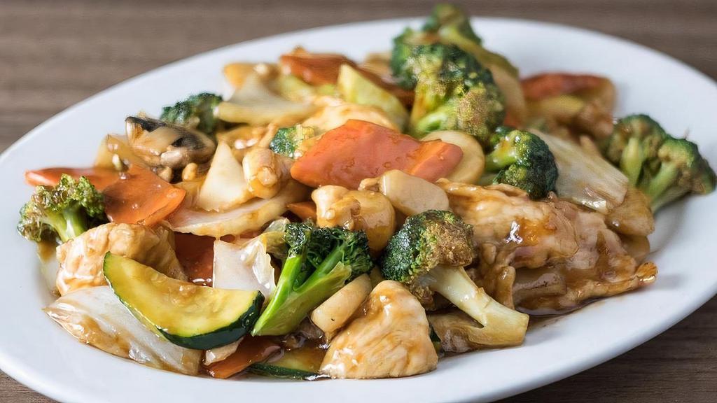 Vegetable Chicken · Stir-fried with mixed veggies in our house brown sauce.