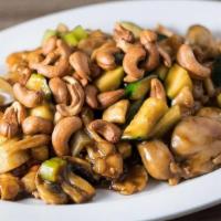 Cashew Chicken · Zucchini, celery, carrots, onions, and water chestnuts, stir-fried in our house brown sauce,...