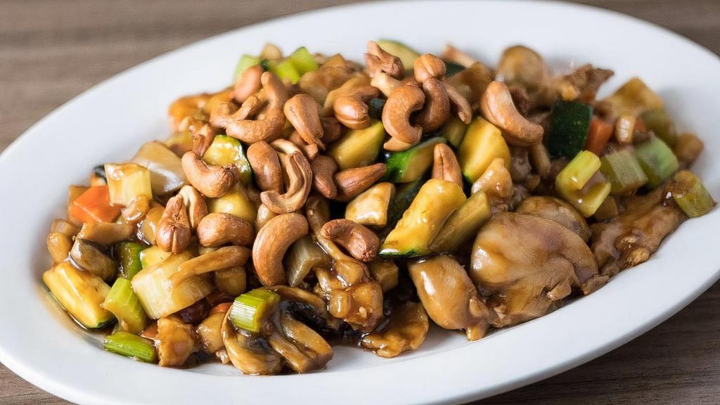 Cashew Chicken · Zucchini, celery, carrots, onions, and water chestnuts, stir-fried in our house brown sauce, then topped with roasted cashews.