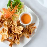 Crab Rangoon · Deep fried cream cheese with wanton skins, crab, celery, and green onion. Served with sweet ...