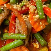 Green Beans With Prik Khing Sauce · Stir-fried Green beans in red chili sauce with bell peppers, carrots, topped with crushed pe...