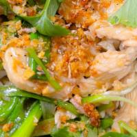 Garlic And Pepper · Stir-fried with your choice of protein in garlic and pepper sauce, served on shredded cabbag...