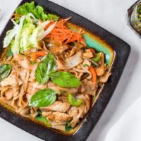 Drunken Noodle · Stir fried flat rice noodle or spaghetti noodles with Thai chili, bell peppers, onion, and b...