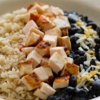 Kid'S Bowl · Chicken, tofu, or salmon, organic rice & organic beans.