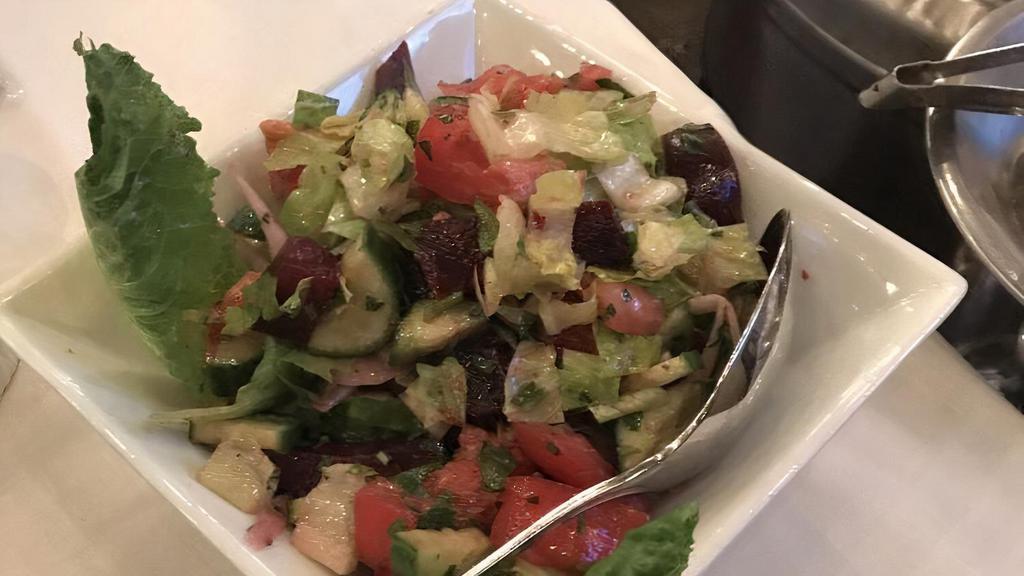 Nara Salad · Cucumbers, tomatoes, parsley, red onions, baby beets, garbanzo beans, in vinaigrette dressing.