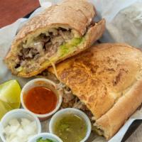 Tortas · Meat, avocado, tomatoes onions, cheese and sour cream.