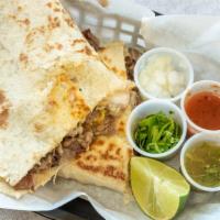 Quesadillas · Meat, beans, cheese and avocado.