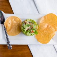 Guacamole De Mexico · Hass avocado, cilantro, serrano chiles, tomatoes, onion fresh lime juice. Serve with tostadi...
