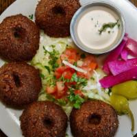 Falafel · Garbanzo and fava bean patties, cilantro, anaheim pepper, green onion, garlic, spices.