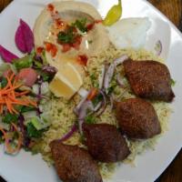 Kibbeh · The cracked wheat outer shell, filled with seasoned ground beef, onions and pine nuts.
.