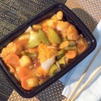 Sweet & Sour Chicken · Crispy chicken with onion, pineapple, carrot and bell pepper in sweet and sour sauce.