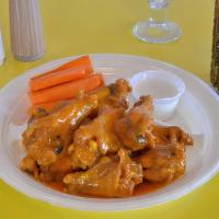 Y. Chicken Wings · Comes with 10 pieces, unless another option is selected. Served with carrots and ranch dress...