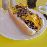 Philly Cheese Steak Combination Sub · Comes with grilled bell peppers, mushrooms and onions with lettuce, tomato. Provolone and Sw...